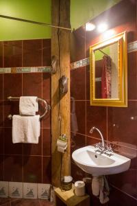 Ett badrum på Fontaine Valhalla Hotel