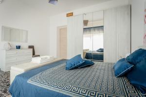 Postel nebo postele na pokoji v ubytování "Un Posticino Carino" Camere Cagliari