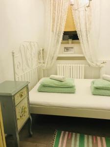 เตียงในห้องที่ Gorod Patriarshie Hostel