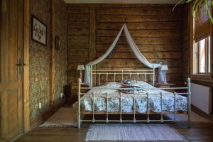 Postel nebo postele na pokoji v ubytování Fontaine Valhalla Hotel
