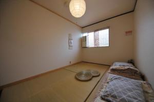 Кровать или кровати в номере Kyoto - House / Vacation STAY 69365