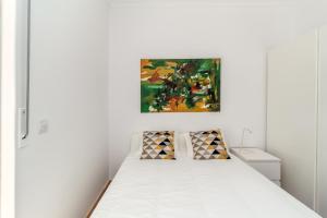 Postel nebo postele na pokoji v ubytování White Apartment - T2 near Beach