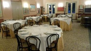 A restaurant or other place to eat at Albergo Ristorante Ferretti
