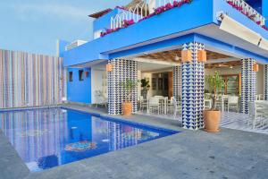 Piscine de l'établissement Hotel Luxury Patio Azul ou située à proximité