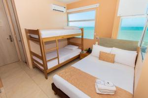 Postel nebo postele na pokoji v ubytování Hotel Aixo Suites By GEH Suites