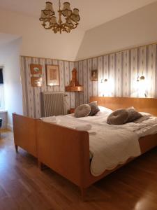 Postel nebo postele na pokoji v ubytování Bergsgården Hotell & Konferens