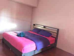 Postel nebo postele na pokoji v ubytování SMILE HOME GUESTHOUSE