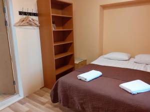 Postel nebo postele na pokoji v ubytování Majaka Hostel