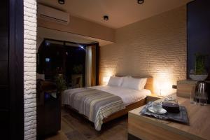 Postel nebo postele na pokoji v ubytování Green Boutique Hotel