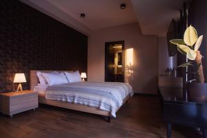 Postel nebo postele na pokoji v ubytování Green Boutique Hotel