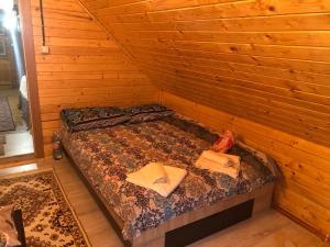 Posteľ alebo postele v izbe v ubytovaní Casa de Vacanta Geoagiu de Sus