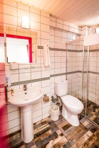 Koupelna v ubytování Mera Park Hotel + 16 fotografií