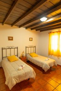 A bed or beds in a room at Casa Carolina 2