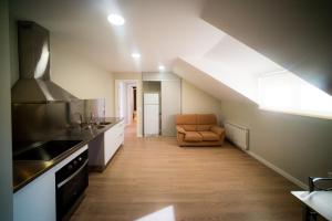 Kuchyň nebo kuchyňský kout v ubytování El Pi de Sant Just - Habitacions i Apartaments + 23 fotografií