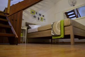 a bedroom with a bunk bed and a staircase at Green Domus in Florence