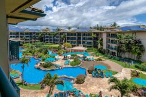 an aerial view of a resort with a pool at Hale Tiare condo in Kapaa