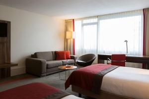 Postel nebo postele na pokoji v ubytování Holiday Inn Eindhoven Centre by IHG