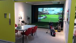 TV a/nebo společenská místnost v ubytování Jeju Noblesse Hotel
