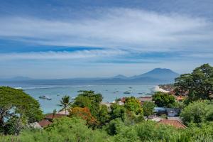 a view of a bay with boats in the water at Beach Tonic Lembongan in Nusa Lembongan