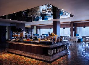 
A restaurant or other place to eat at Grand Mercure Yogyakarta Adi Sucipto - GeNose Ready, CHSE Certified
