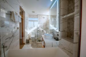 Koupelna v ubytování Bella Vita Hotel