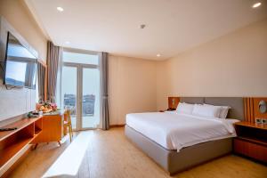 Postel nebo postele na pokoji v ubytování Bella Vita Hotel