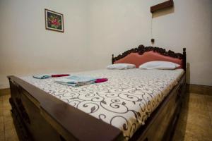 Katil atau katil-katil dalam bilik di Hotel Sumaryo
