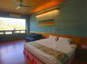 Postel nebo postele na pokoji v ubytování Ying Tian Ye Homestay