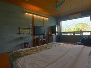 Postel nebo postele na pokoji v ubytování Ying Tian Ye Homestay