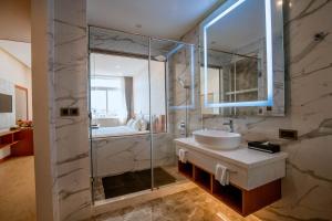 Koupelna v ubytování Bella Vita Hotel