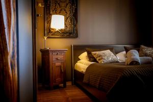 Posteľ alebo postele v izbe v ubytovaní Aparthotel Oberża