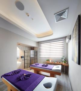 Postel nebo postele na pokoji v ubytování Lalila Blue Suites