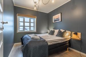 Postel nebo postele na pokoji v ubytování Lofoten Apartments
