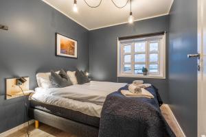 Postel nebo postele na pokoji v ubytování Lofoten Apartments