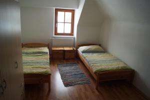 Letto o letti in una camera di Gasthof Bad Edling