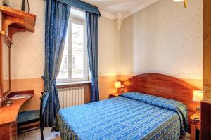Posteľ alebo postele v izbe v ubytovaní Hotel Verona Rome