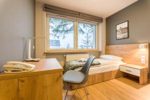 Posteľ alebo postele v izbe v ubytovaní Hotel***Gorce + 37 fotografií