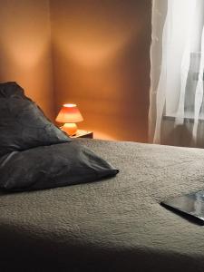 Łóżko lub łóżka w pokoju w obiekcie l'Oustal des Bancs