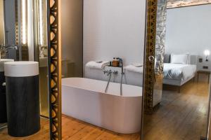 Ένα ή περισσότερα κρεβάτια σε δωμάτιο στο S Paul City Hotel