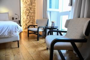 Ένα ή περισσότερα κρεβάτια σε δωμάτιο στο S Paul City Hotel