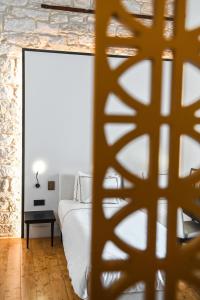 Ένα ή περισσότερα κρεβάτια σε δωμάτιο στο S Paul City Hotel