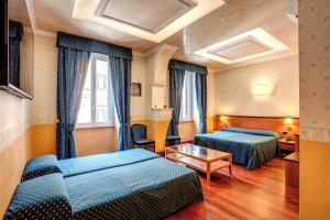 Posteľ alebo postele v izbe v ubytovaní Hotel Verona Rome