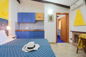 Postel nebo postele na pokoji v ubytování Relais Il Frantoio