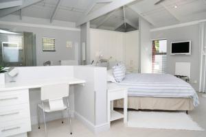 Ένα ή περισσότερα κρεβάτια σε δωμάτιο στο Whalejoy - A glimpse of heaven