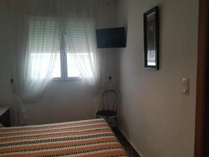 Postel nebo postele na pokoji v ubytování Antolin Guest House