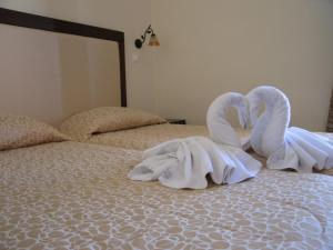Posteľ alebo postele v izbe v ubytovaní Blue Sea Hotel Apartments