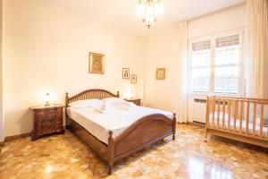 Postel nebo postele na pokoji v ubytování Realkasa Montagnola Apartment + 17 fotografií