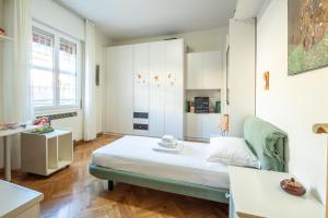 Postel nebo postele na pokoji v ubytování Realkasa Montagnola Apartment