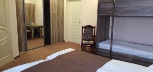 Postel nebo postele na pokoji v ubytování Mon Ami Hotel