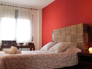 Posteľ alebo postele v izbe v ubytovaní Suitur beach apartment with pool + 22 fotografií